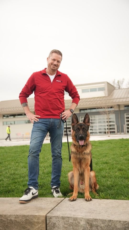 Hoosier Pup trainer working with a German Shepherd in Bloomington